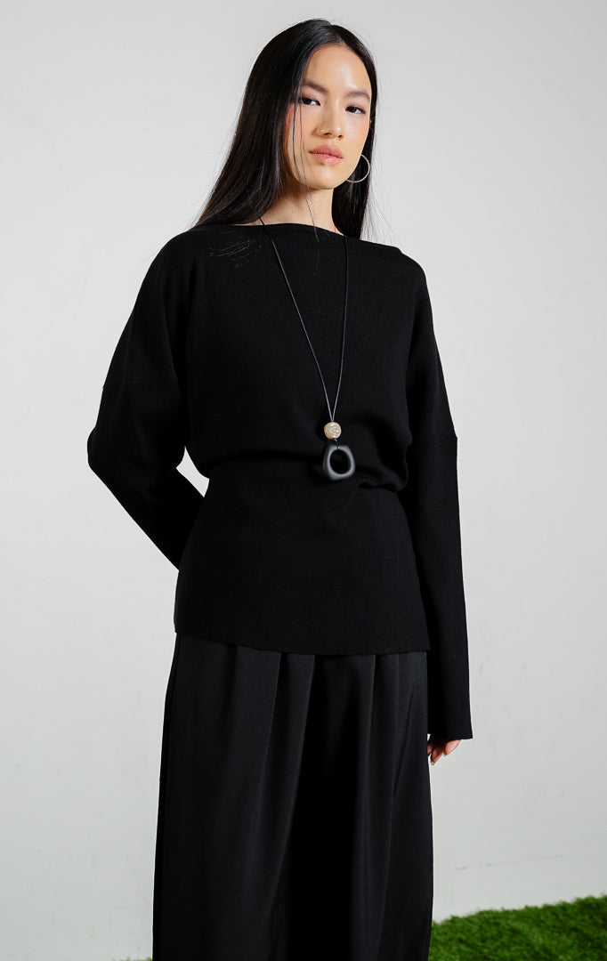 Odile Wide Neckline Cinched Waist Knit Top warna black, baju atasan rajut lengan panjang wanita model kerah lebar dengan kerutan pinggang warna hitam dari This Is April.
