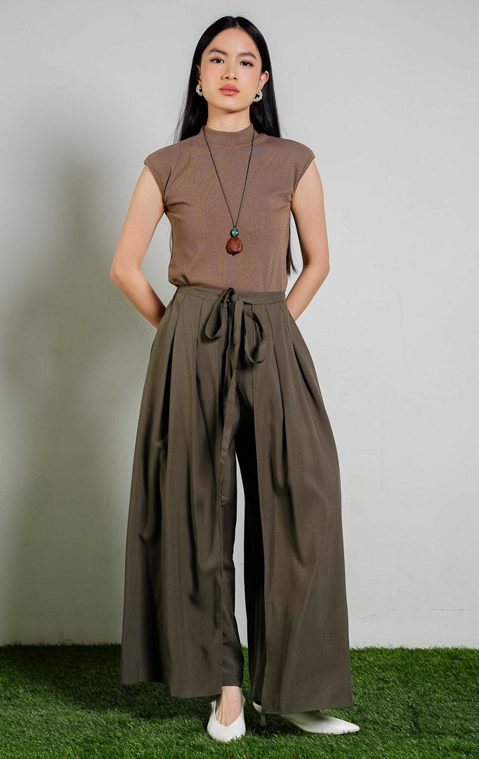 Johnston Tie-Waist Overlap Wide Leg Pants warna army green, celana panjang kulot wanita model tumpuk depan dengan tali pinggang warna hijau army dari This Is April.