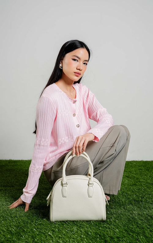 Zora Checker Textured Knit Cardigan warna pink, baju kardigan rajut lengan panjang wanita warna merah muda pastel dengan kancing emas dari This Is April.