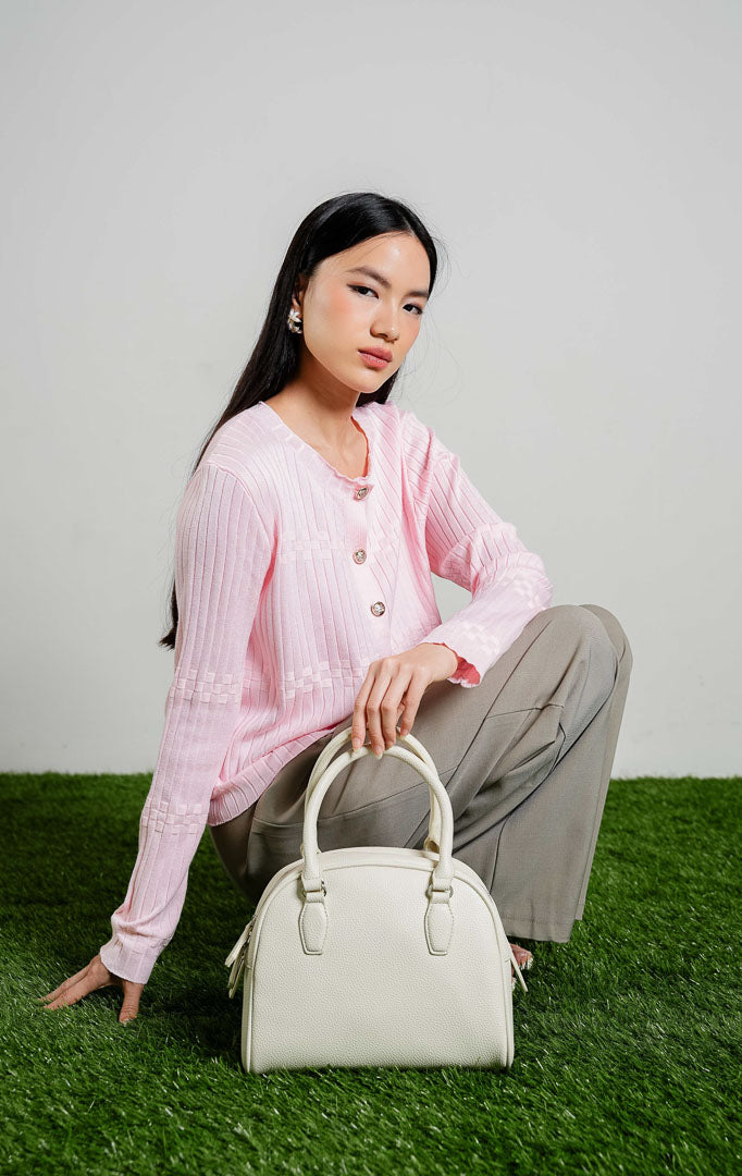 Zora Checker Textured Knit Cardigan warna pink, baju kardigan rajut lengan panjang wanita warna merah muda pastel dengan kancing emas dari This Is April.