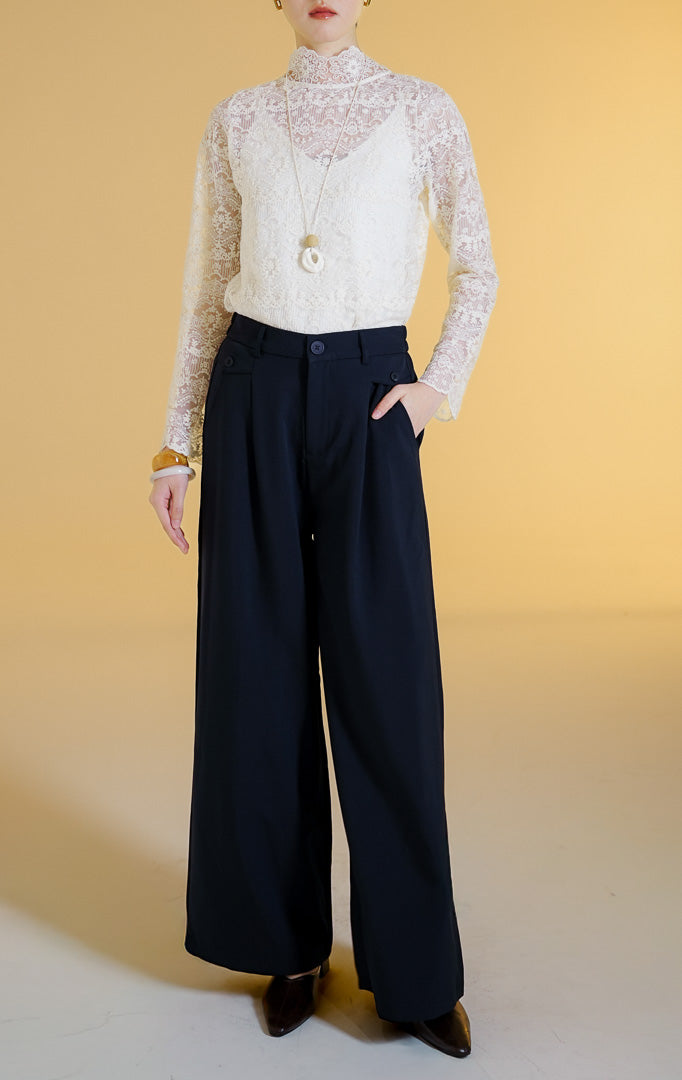 Pakaian wanita model celana panjang bahan potongan lurus (classic straight-leg pants) warna navy Adelie Pants untuk gaya kerja profesional maupun kasual.