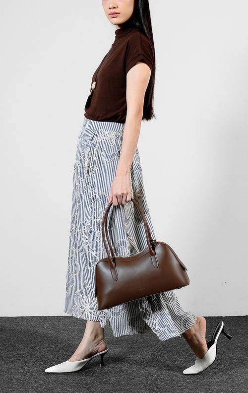 Bawahan wanita model rok panjang maksi motif garis-garis bahan bertekstur warna biru (blue pin-stripe cord maxi skirt) Dorothea Skirt untuk gaya kasual yang rapi dan feminin.