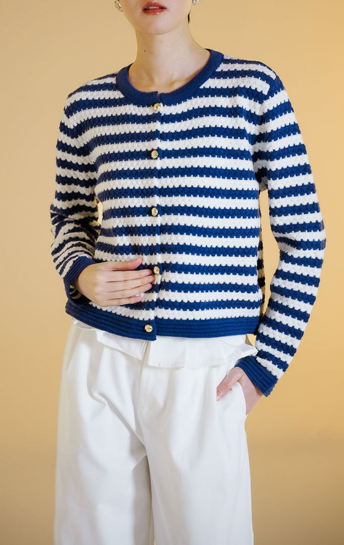 Pakaian hangat wanita model cardigan rajut lengan panjang berkerah bulat kancing depan motif garis dengan detail tekstur timbul (striped bobble knit cardigan) warna navy Lucerne Cardigan untuk gaya kantor dan kasual anggun.