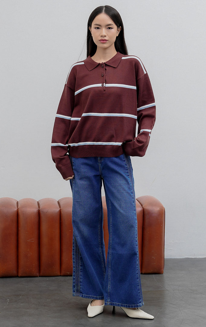 Sweter rajut wanita kerah polo warna cokelat tua (dark brown) Alexis Sweater bermotif garis-garis (striped) dengan bukaan kancing depan (button closure) berbahan lembut dan stretchy.