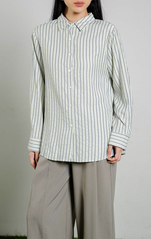 Alexandria Seersucker Striped Button-Up Shirt Top warna light green, kemeja lengan panjang wanita motif garis hijau putih bahan katun crinkle seersucker dari This Is April. 