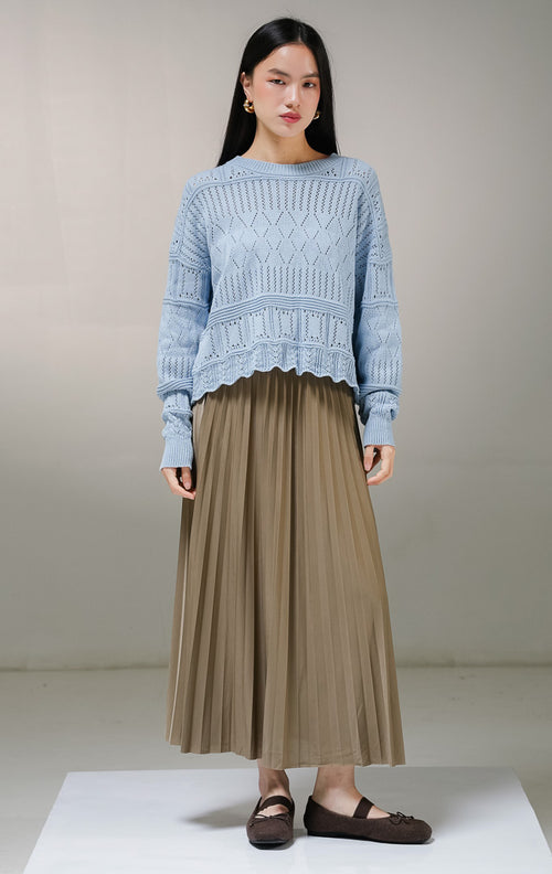 Atasan sweater rajut lengan panjang wanita This Is April Clarissa Sweater warna biru muda, model jaring mesh knit transparan dengan variasi pola rajutan belah ketupat dan garis vertikal. 