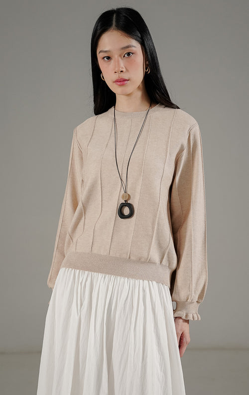  Kikiro Sweater Khaki dari This Is April, sweater rajut warna khaki dengan detail list vertikal kontras dan ujung lengan puff sleeve