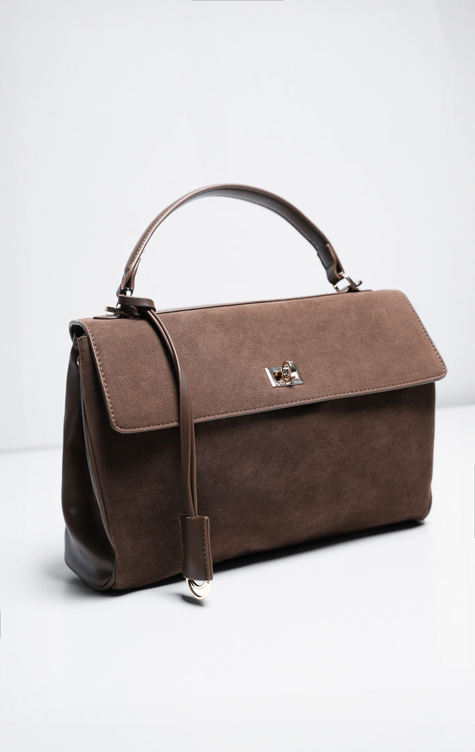 Tas wanita model bahu dan jinjing bahan kulit suede warna cokelat (brown suede flap shoulder bag) Lalitha Bag dengan detail penutup putar warna emas yang elegan dan modern