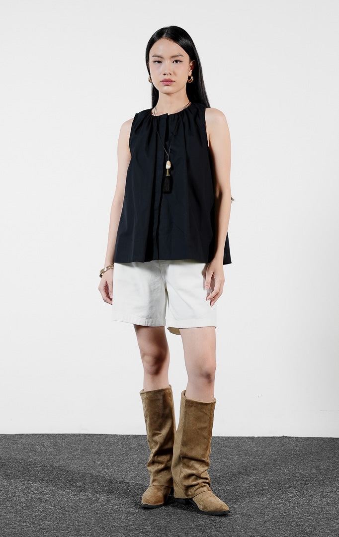 Pakaian wanita model atasan blouse katun tanpa lengan kerah tinggi dengan detail lipit dan kancing tersembunyi (high-neck concealed-placket cotton top) warna hitam Jolaine Top untuk gaya kasual elegan yang rapi. 