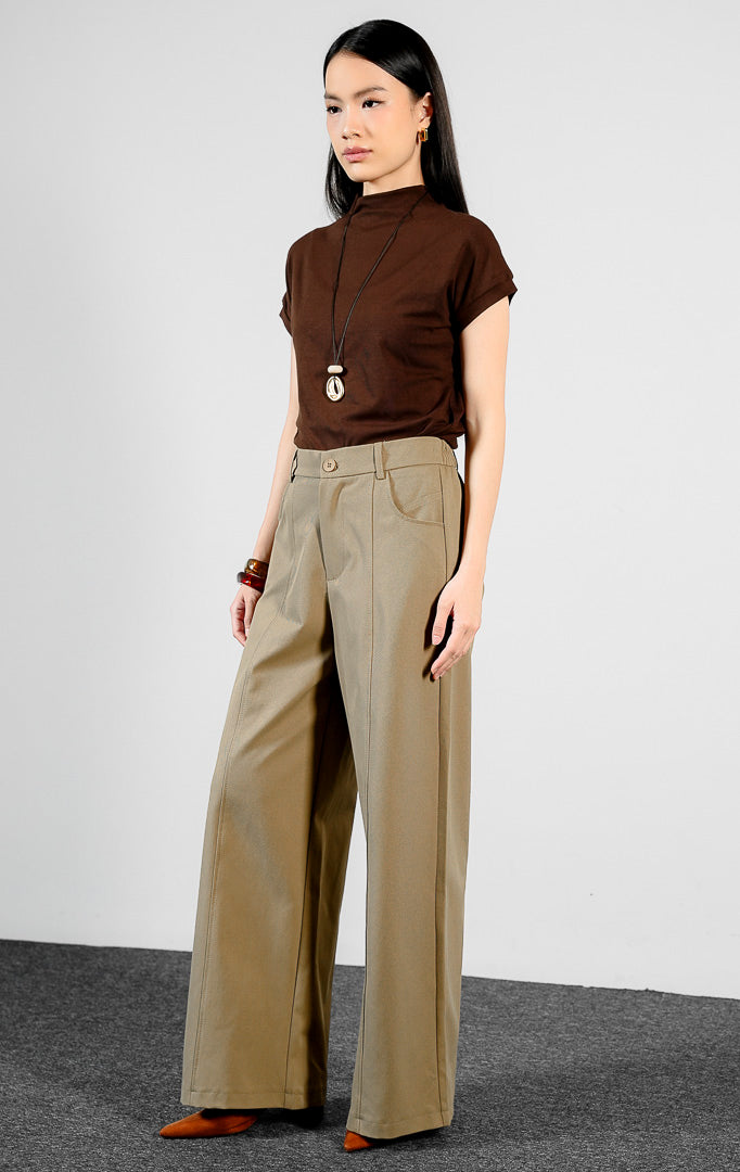 Bawahan wanita model celana panjang katun twill potongan lebar (brown center-seam wide-leg pants) Ottile Pants dengan detail garis tengah dan siluet modern yang rapi. 